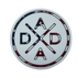 Experience the Dada X™ American Flag Sticker from Mama X™ Brand, showcasing a circular emblem with "DAD" in a unique vertical and diagonal layout. The intersecting "A" at the top and bottom exudes patriotic flair, adorned with an American flag design featuring red, white, and blue colors along with stars. Perfect for sticker application, this emblem is framed by a matching flag-pattern border.