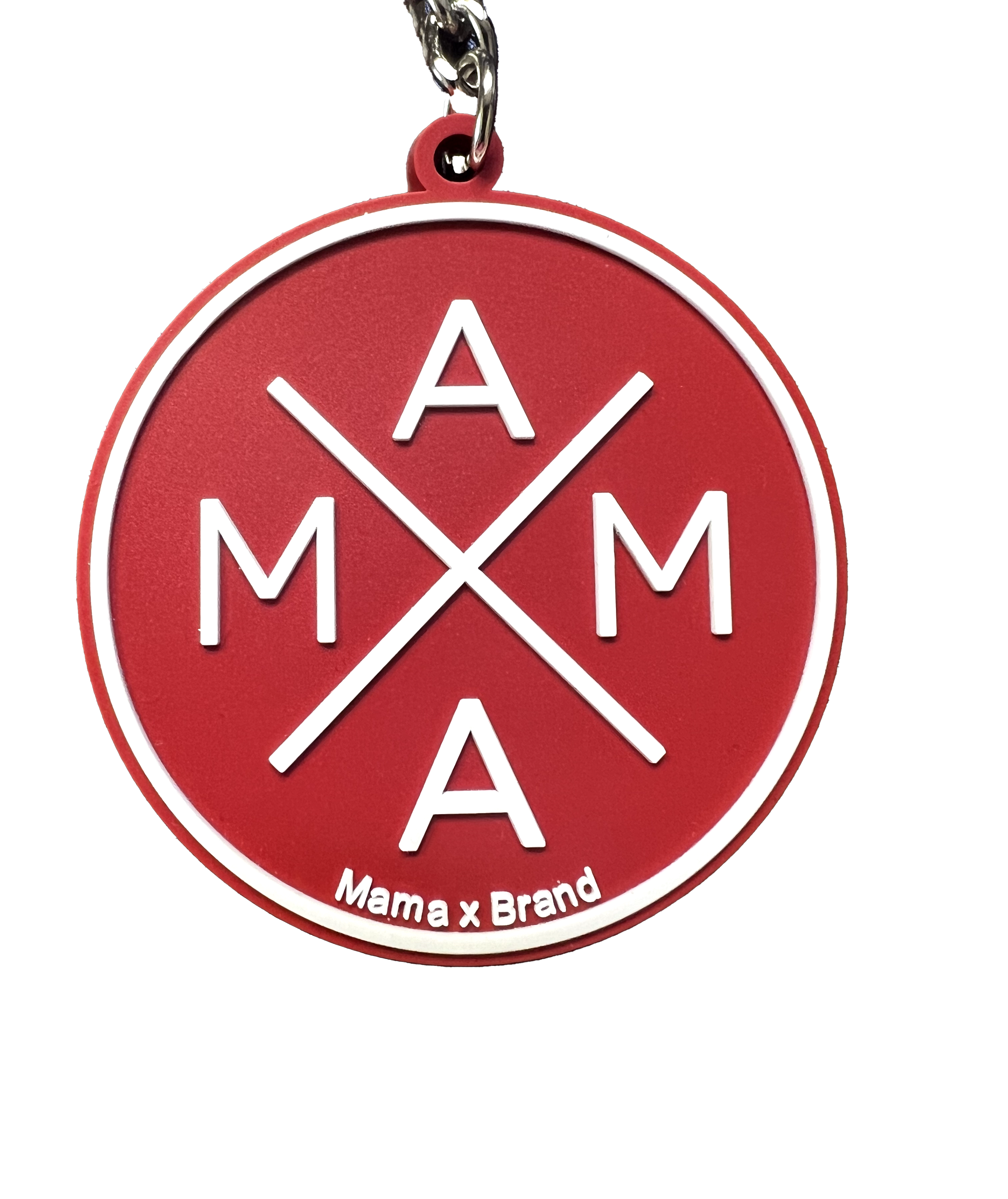 The Mama X™ Keychain is a chic accessory featuring a red circular design with a white border and the word 