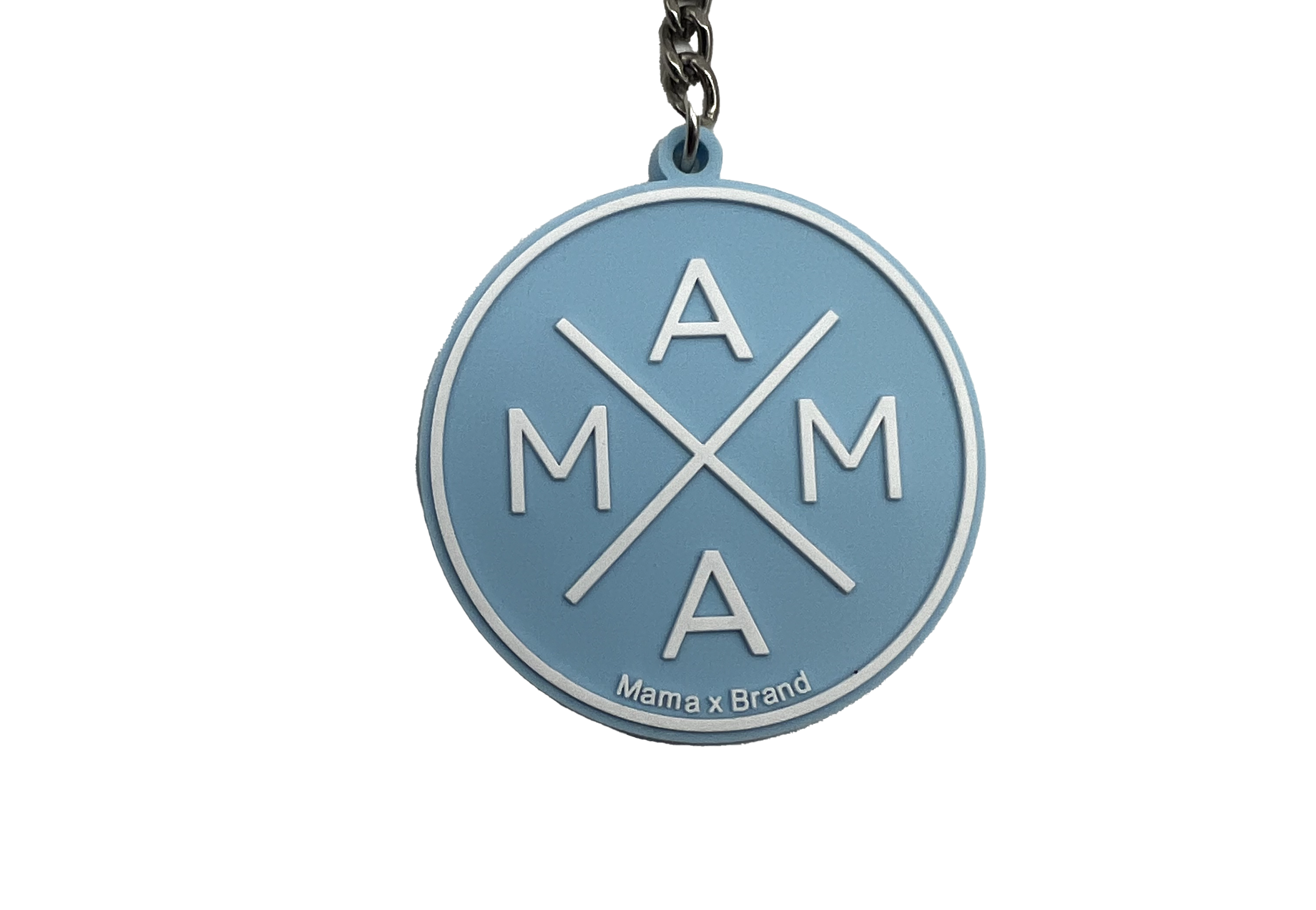 A round, light blue Mama X™ Keychain with the letters 