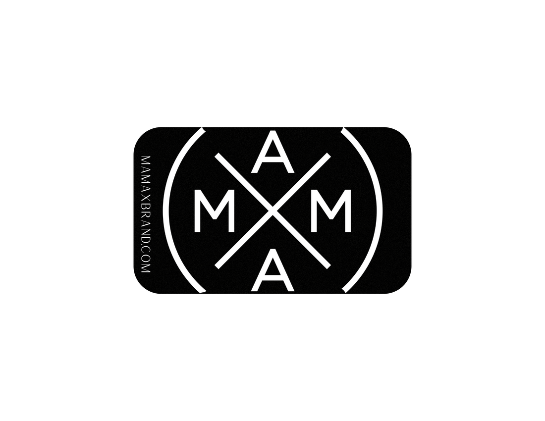 The MXB E-Gift Card by Mama X™ Brand showcases a design with the word "MAMA" in bold capital letters arranged within a circle, intersected by two diagonal lines forming an X at the center. The URL "MAMAXBRAND.COM" is vertically aligned on the left side. This sleek black background with white text and lines design makes it an ideal choice for email delivery gift cards.