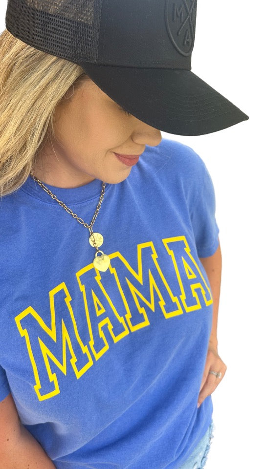 A person wearing the comfiest blue Mama T-Shirt from Mama X™ Brand, featuring the word 