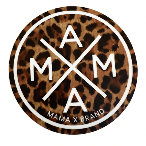 The Mama X™ Animal Print Sticker is a circular design featuring a leopard print background, with "MAMA" written in large white letters that intersect to form an "X" shape. Near the bottom of the circle, "Mama X™ Brand" is elegantly written in white, making it look like a stylish sticker for any surface.
