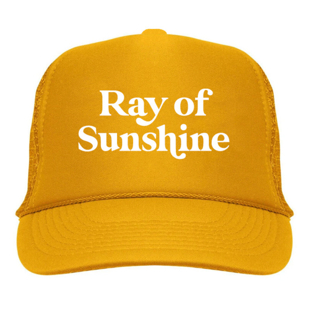 The Ray of Sunshine Trucker Hat by Mama X™ Brand is a bright yellow, 5-panel cap featuring white text reading "Ray of Sunshine" on the solid front panel. This hat, ideal for sun protection, also includes a breathable mesh back.