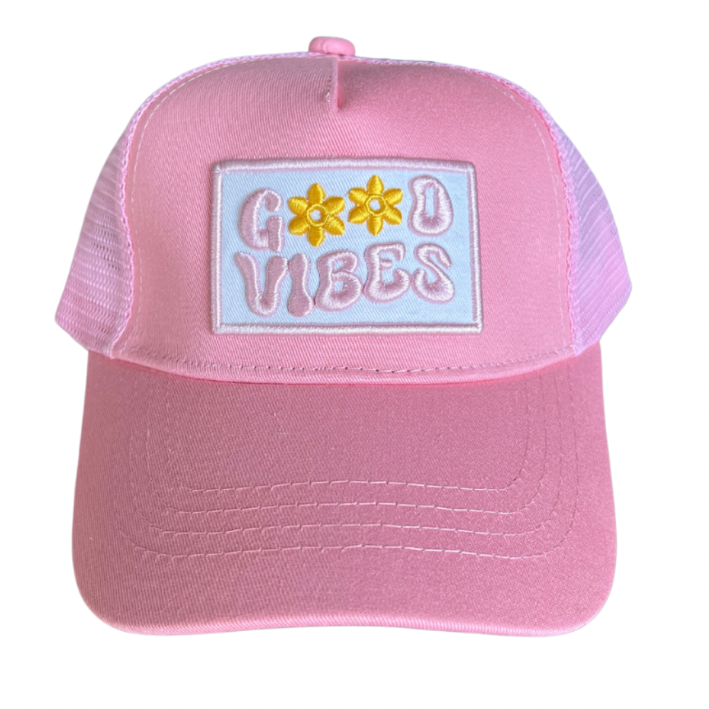 The Good Vibes Trucker Hat by Mama X™ Brand is an adorable pink 5-panel cap that displays 